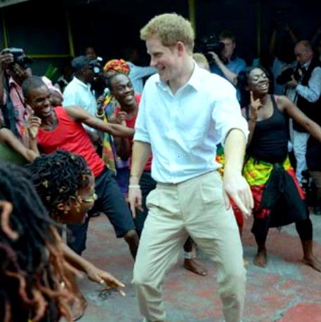 PRINCE HARRY LEARNS DANCE MOVES, BEATS BOLT PRINCE HARRY LEARNS DANCE MOVES, BEATS BOLT